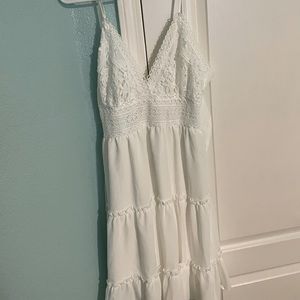 White, backless dress with beautiful stitching